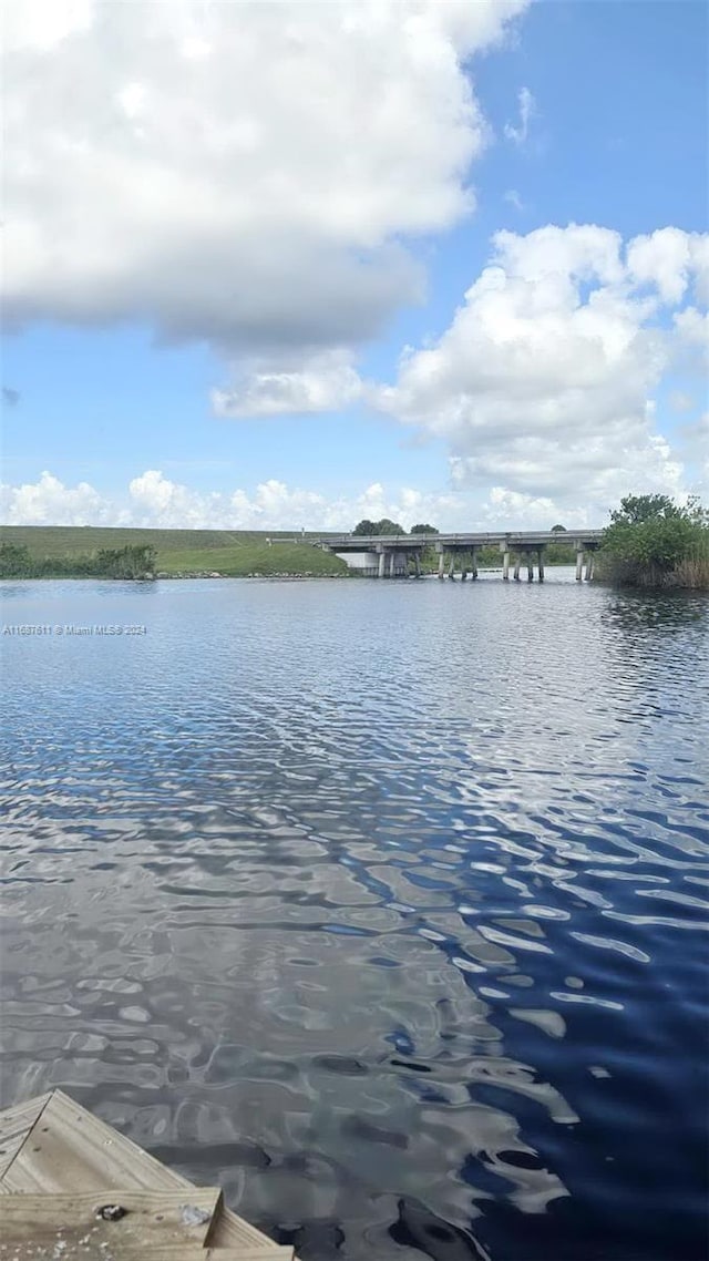 water view featuring a notable bridge