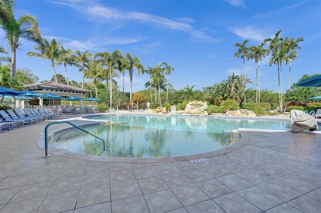 view of swimming pool featuring a gazebo and a patio