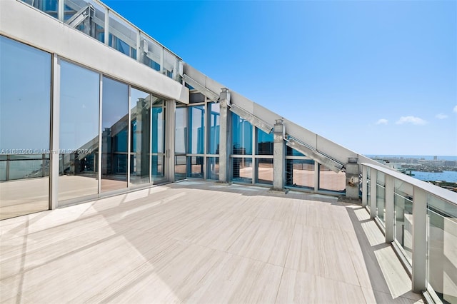 view of patio featuring a balcony