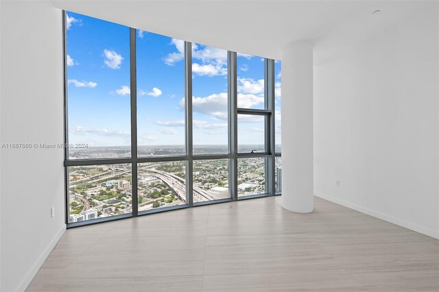 empty room with expansive windows