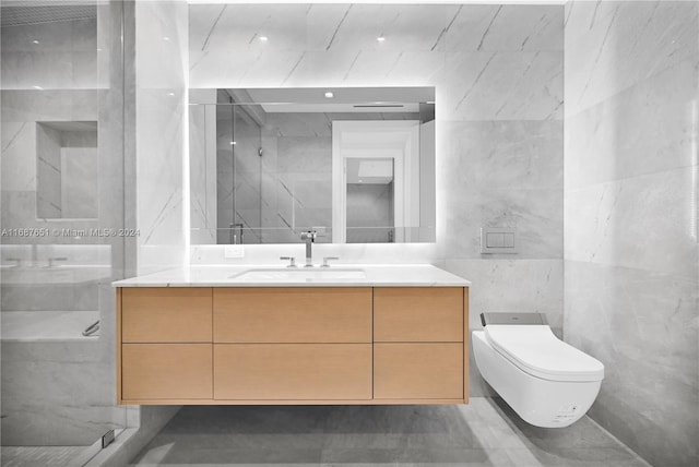 bathroom with vanity and tile walls