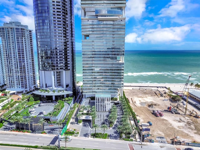 drone / aerial view with a view of the beach and a water view