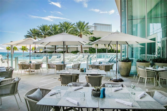 view of patio / terrace featuring a water view