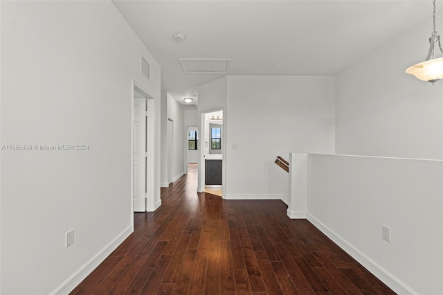 hall featuring dark wood-type flooring