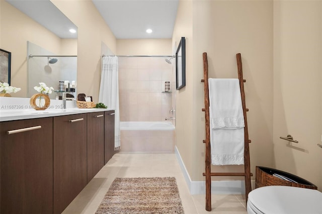 full bathroom featuring vanity, shower / bath combination with curtain, toilet, and tile patterned flooring