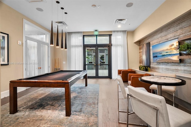 game room with french doors, billiards, and wood-type flooring