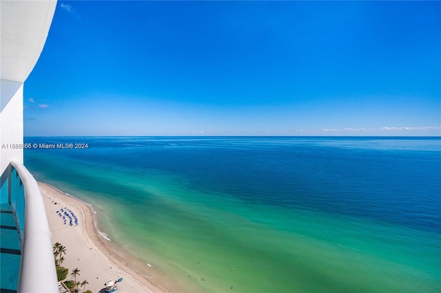 property view of water featuring a beach view