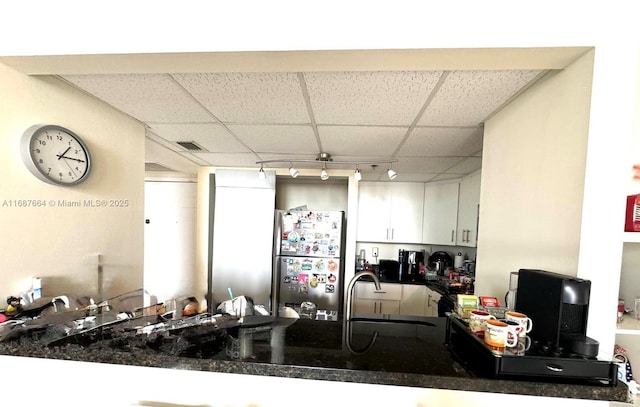 540 Brickell Key Dr Unit 1801, Miami, FL 33131 - kitchen featuring freestanding refrigerator, a drop ceiling, a peninsula, and white cabinetry