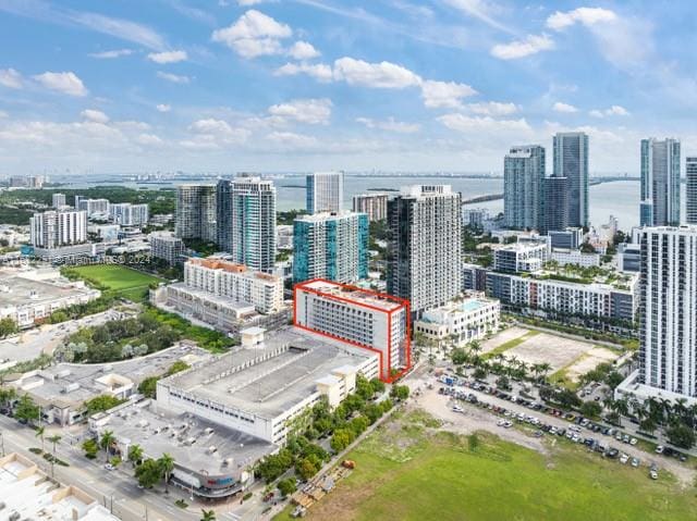 property's view of city with a water view