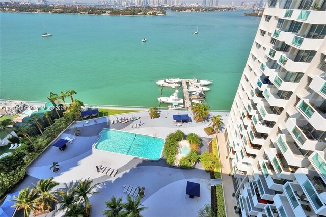 birds eye view of property featuring a water view