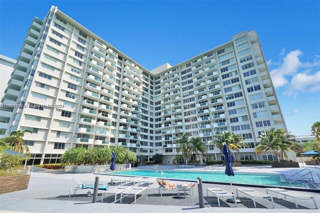 view of swimming pool with a patio