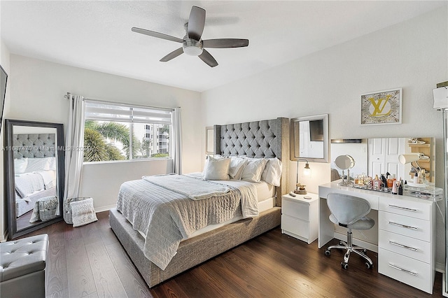 bedroom featuring dark hardwood / wood-style flooring and ceiling fan