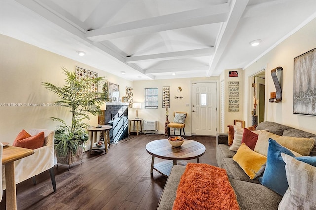 living room with dark wood-type flooring, beamed ceiling, an AC wall unit, and a fireplace