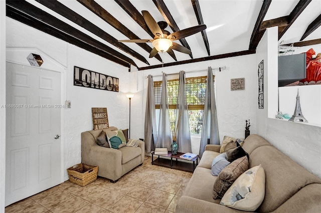 tiled living room featuring beamed ceiling and ceiling fan