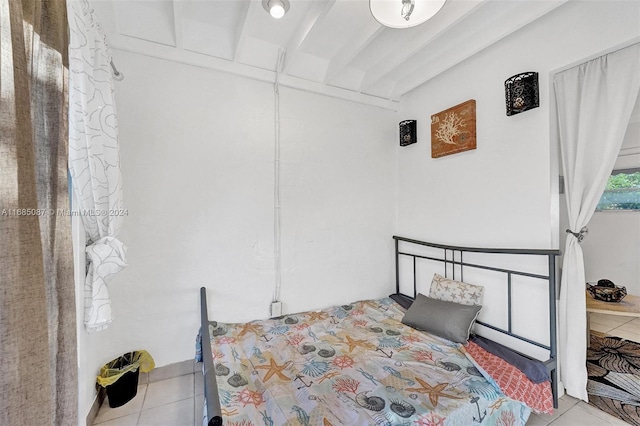 bedroom with light tile patterned flooring