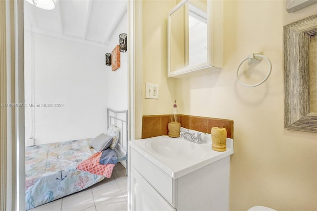 bathroom with vanity and tile patterned floors