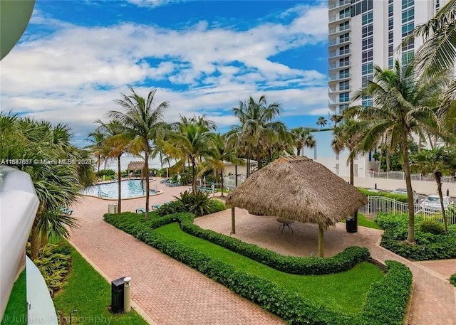 view of property's community featuring a gazebo and a pool