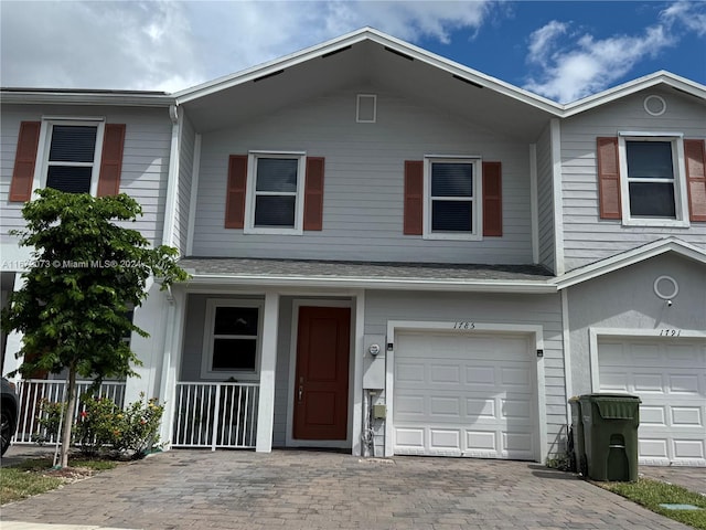 view of property featuring a garage