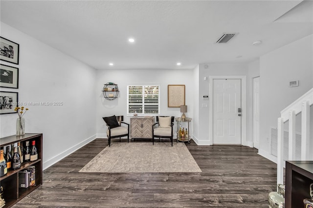 living area with dark wood-type flooring