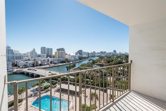 balcony featuring a water view