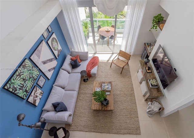 living room with tile patterned flooring