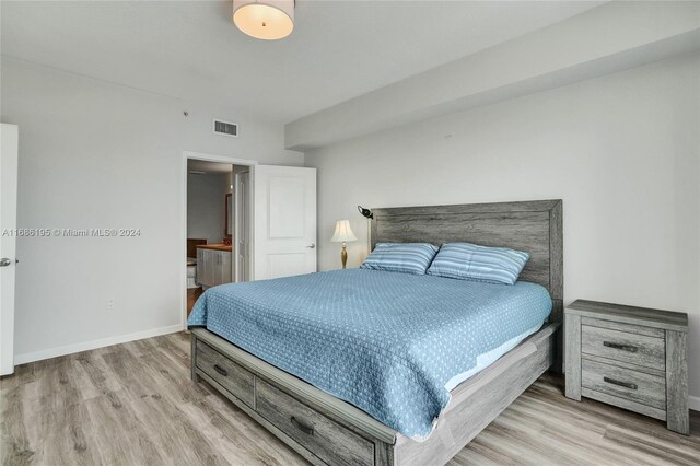 bedroom featuring light wood-type flooring