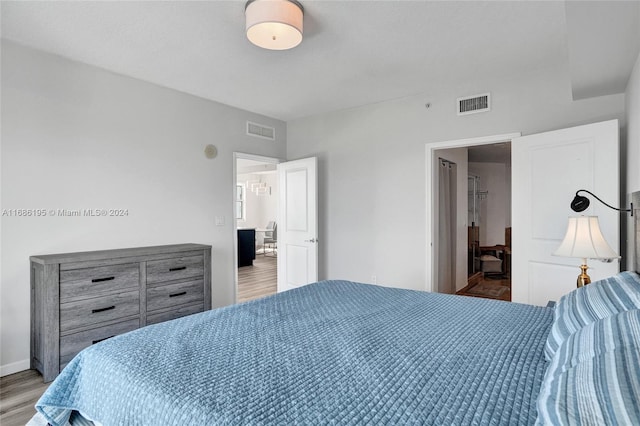 bedroom with light hardwood / wood-style flooring