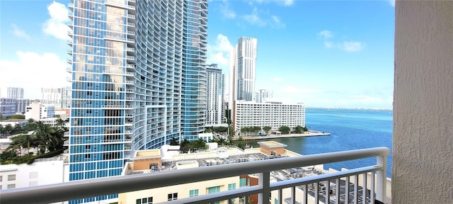 balcony featuring a water view