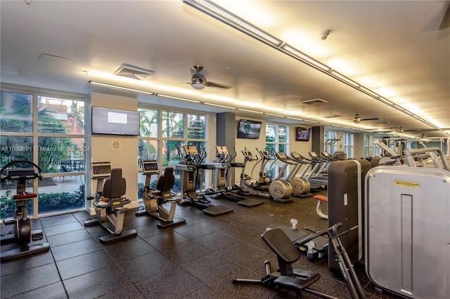 exercise room with ceiling fan