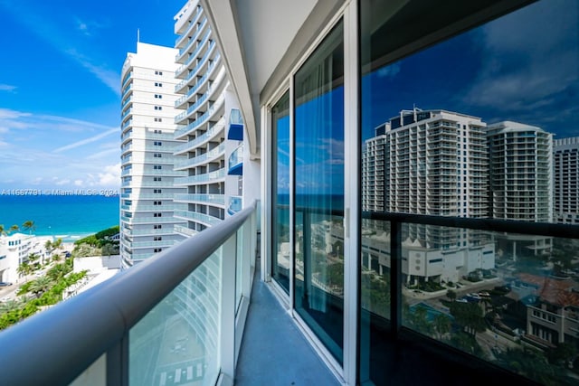 balcony featuring a water view