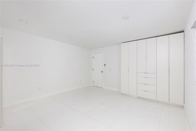 unfurnished bedroom featuring a closet