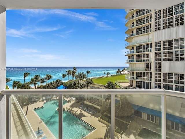 balcony featuring a water view