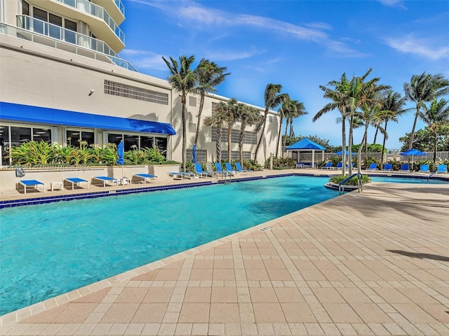 view of pool featuring a patio