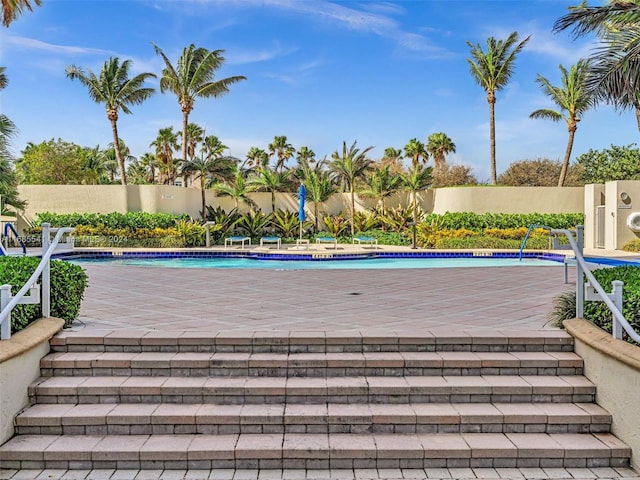 view of pool featuring a patio