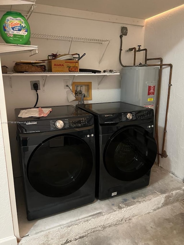 washroom with washer and clothes dryer