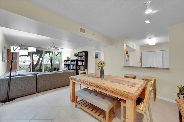 519 E Sheridan St Unit 106, Dania Beach, FL 33004 - dining space featuring light tile patterned floors and a ceiling fan