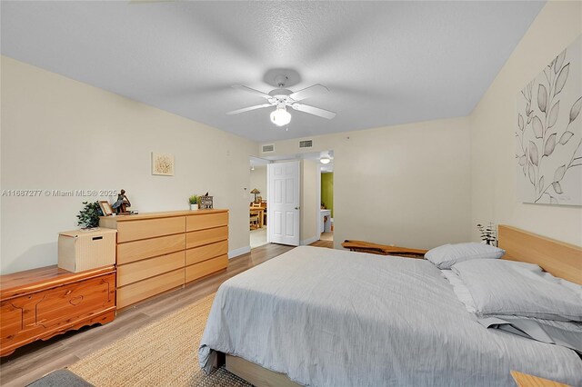 519 E Sheridan St Unit 106, Dania Beach, FL 33004 - bedroom featuring light wood finished floors and ceiling fan