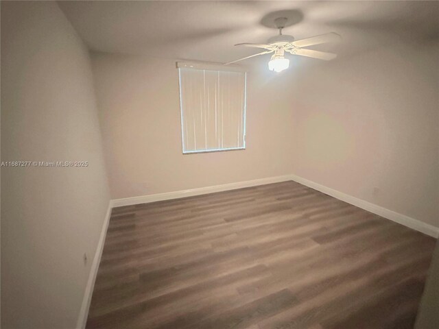 519 E Sheridan St Unit 106, Dania Beach, FL 33004 - unfurnished room with a ceiling fan and dark wood finished floors