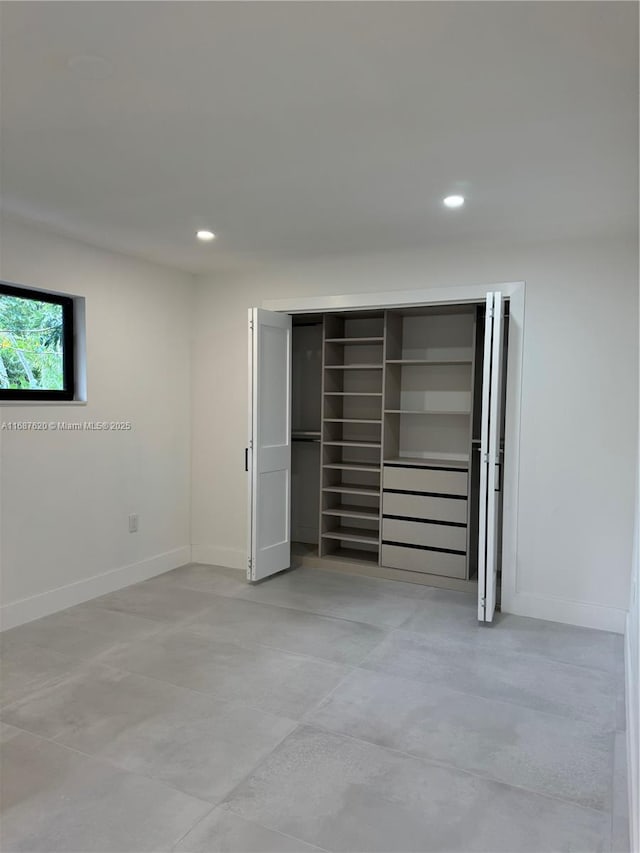 unfurnished bedroom featuring a closet