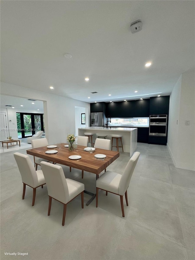 dining area featuring french doors