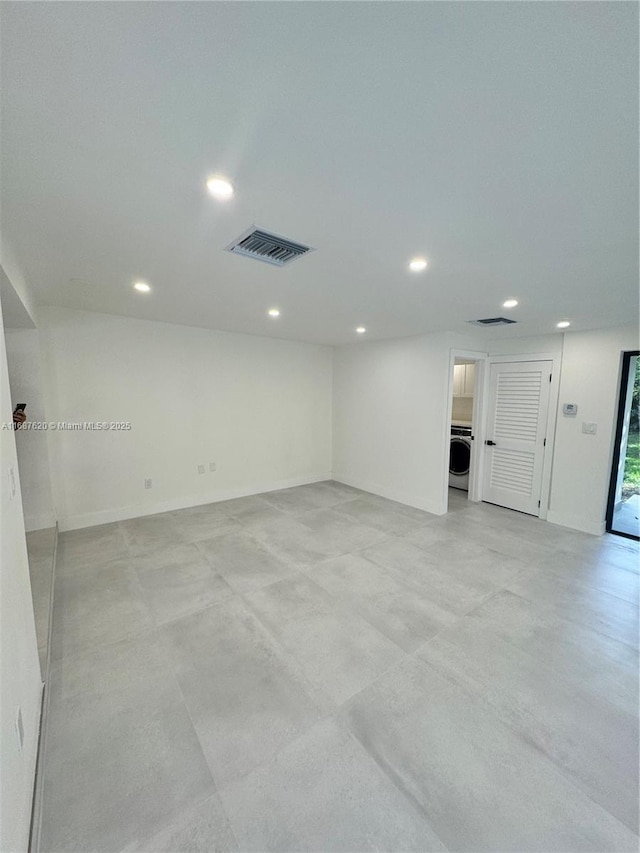 spare room featuring washer / dryer