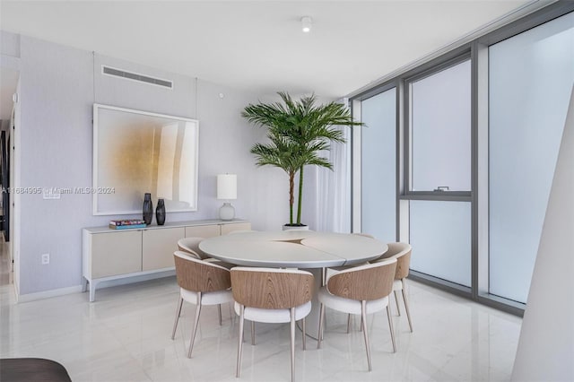 dining room with a healthy amount of sunlight