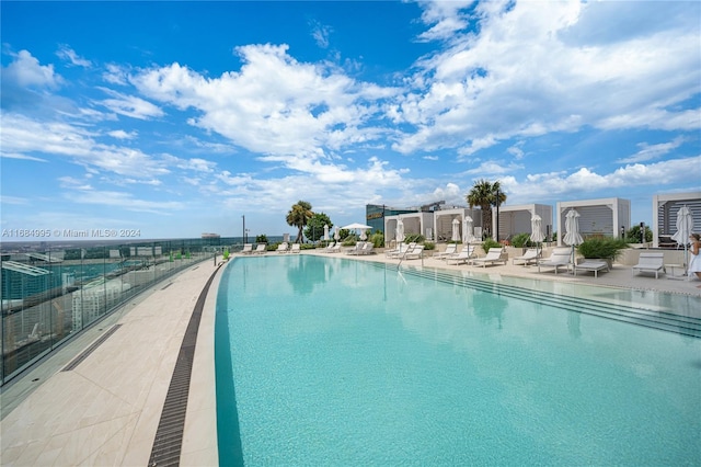 view of swimming pool with a patio area