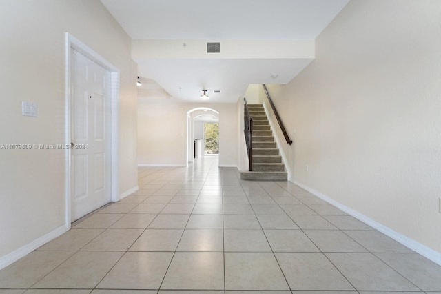 interior space with light tile patterned floors