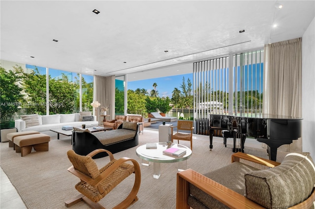 rear view of property with outdoor lounge area and a balcony