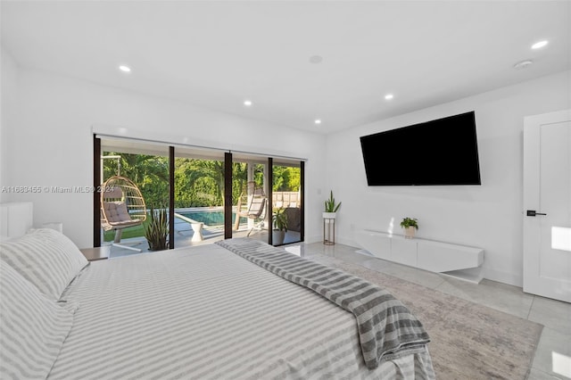 bedroom with light tile patterned floors and access to exterior