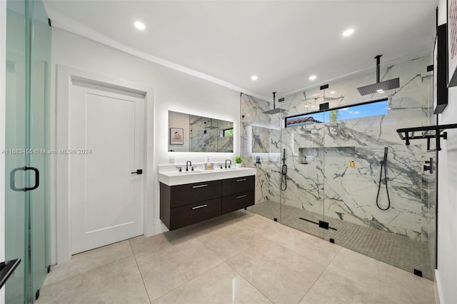 bathroom with walk in shower, tile patterned flooring, and vanity