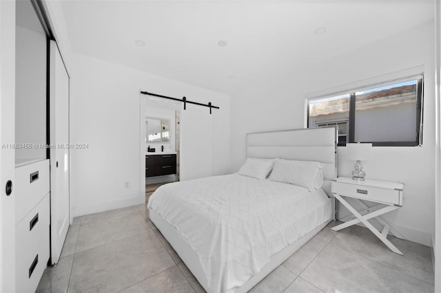 bedroom with a barn door