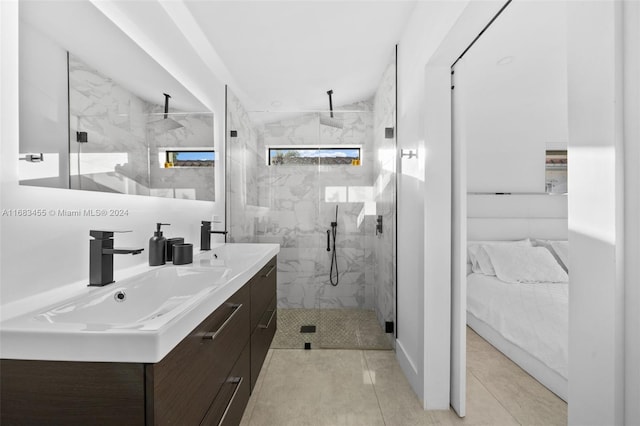 bathroom with vanity, tile patterned floors, and a shower with shower door