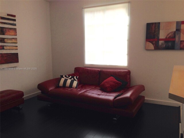 living room with dark wood-type flooring